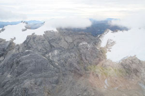Four-fifths of the ice near the peak of Indonesia’s Puncak Jaya has disappeared in the last 70 years. Photo taken Aug. 27, 2008 from a helicopter by expedition co-leader Dwi Susanto.