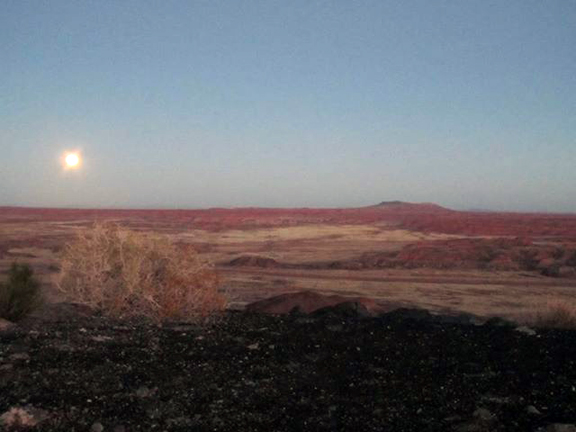 full moon over desert