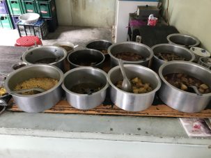 Example of the Burmese food we had for lunch in Ganwin on the way to Kale. You pick an entree from one of the pots on and it comes with small bowls of a half dozen side dishes, rice and soup.