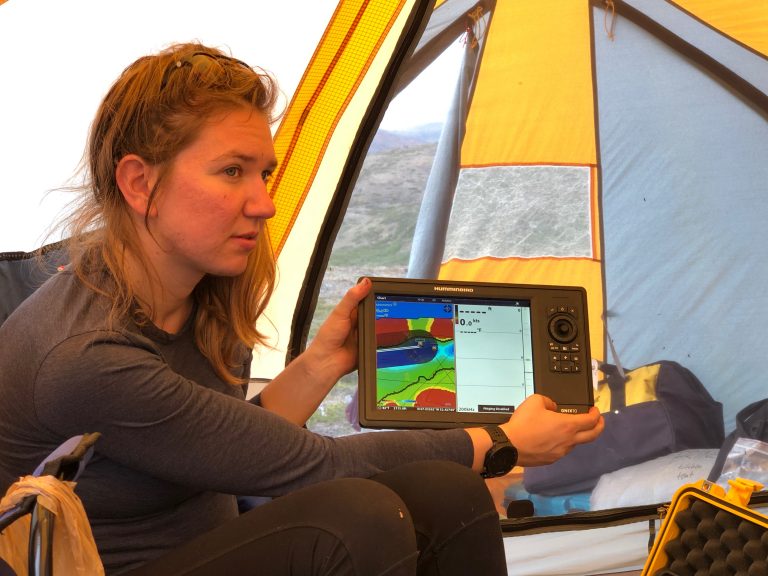 Allison Cluett shows the 2016 bathymetry data from Lake ‘Gus’. (M. Turrin)