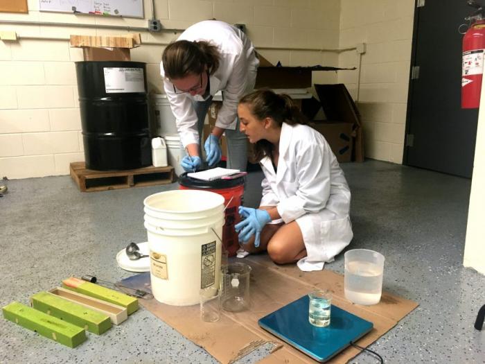 High school intern Julia Grandury (right) works with Elizabeth Eiden (left), an undergraduate intern from the California Institute of Technology. The two students are spending the summer conducting research on lava lakes and open-vent volcanoes in the lab of Lamont scientist Einat Lev