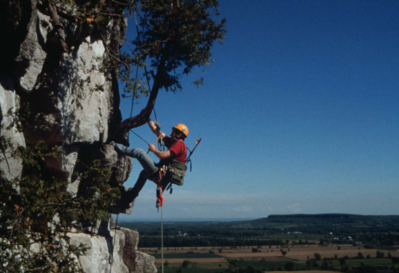 Peter Kelley sampling a cliff