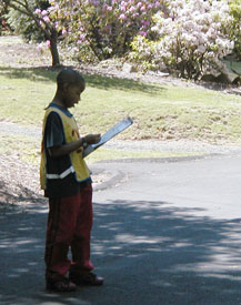 Participant intently places sticker on map.